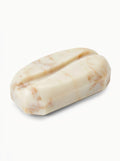 ** **Marmorierte Seife mit geschwungener Form**
